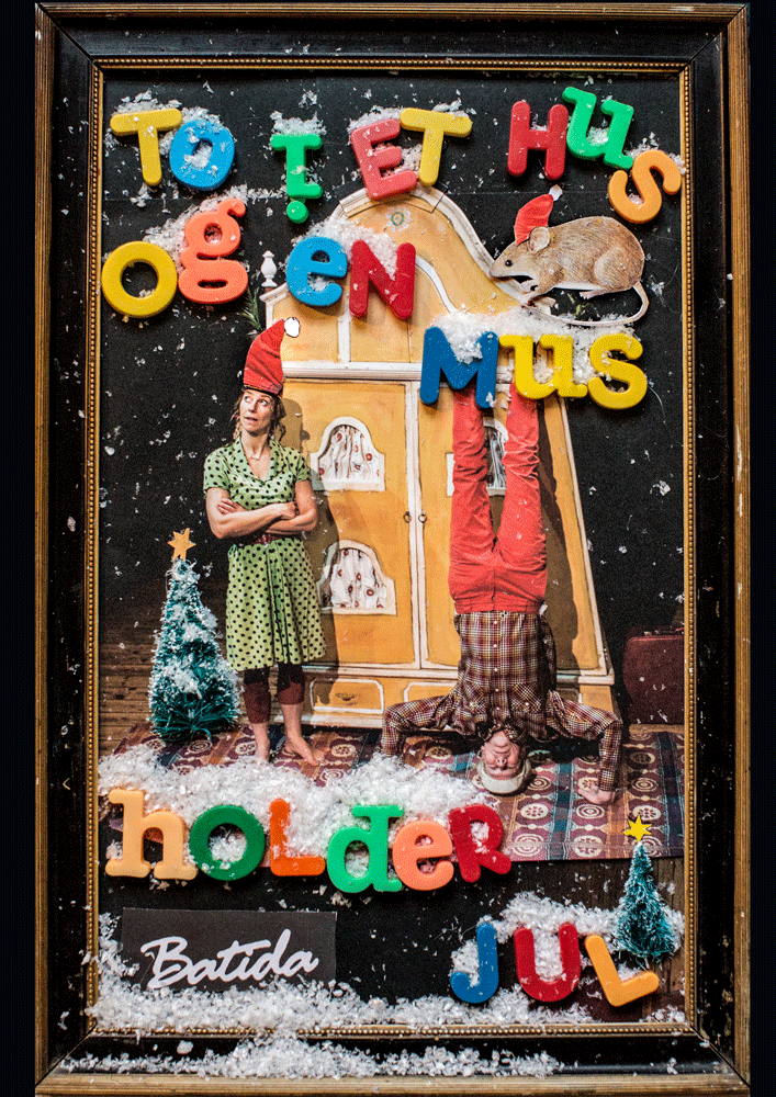 Two in a house and a mouse celebrate Christmas